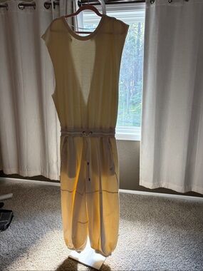 Sleeveless Drawstring Jumpsuit in Pale Yellow